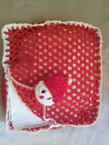 A crochet tissue holder